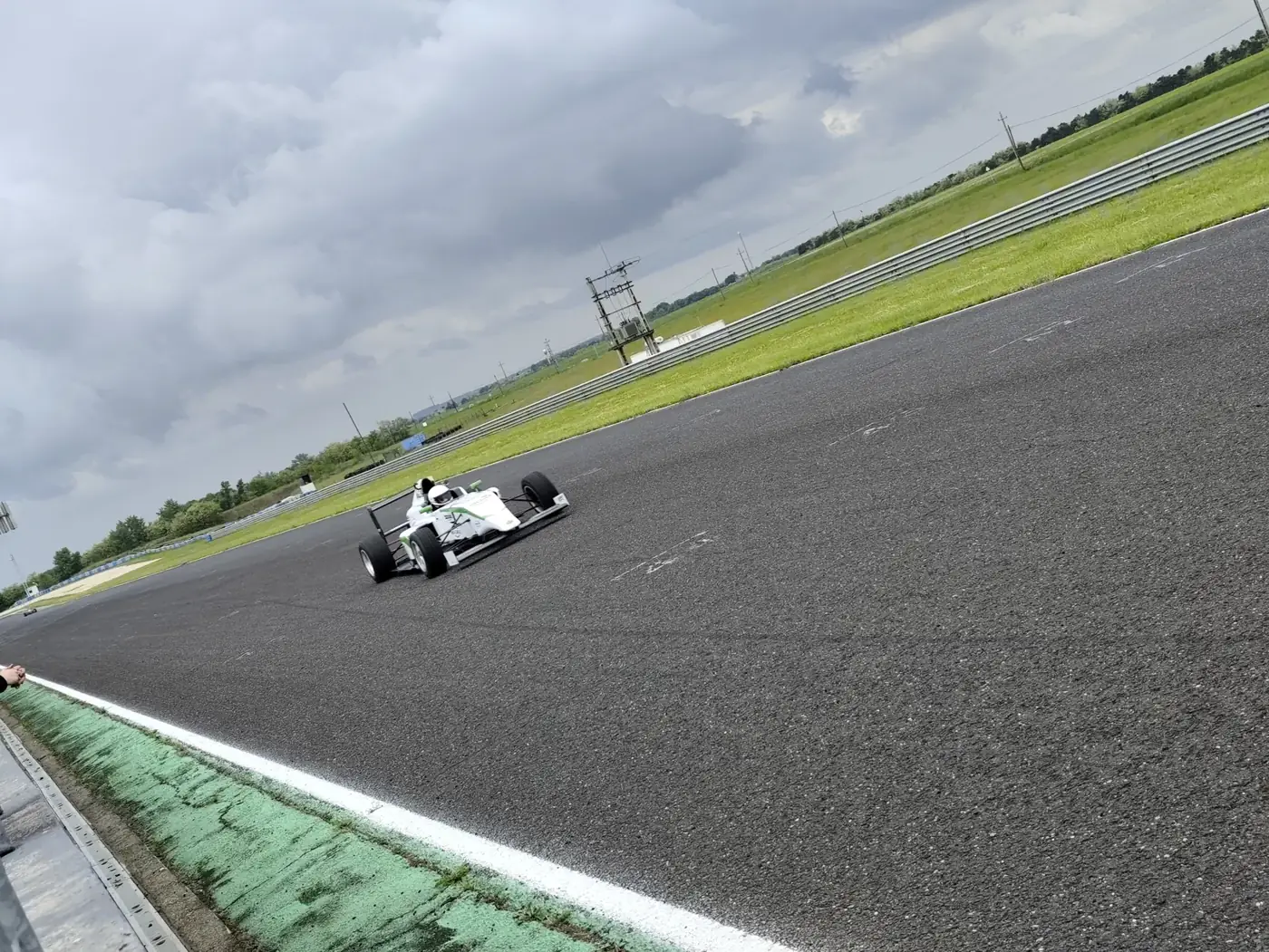 The Formula 4 car on the main straight