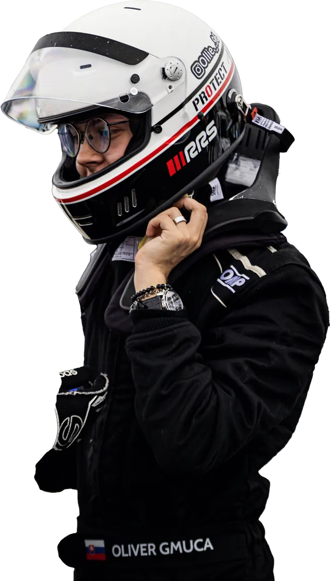 Oliver Gmuca pulling on his racing helmet
