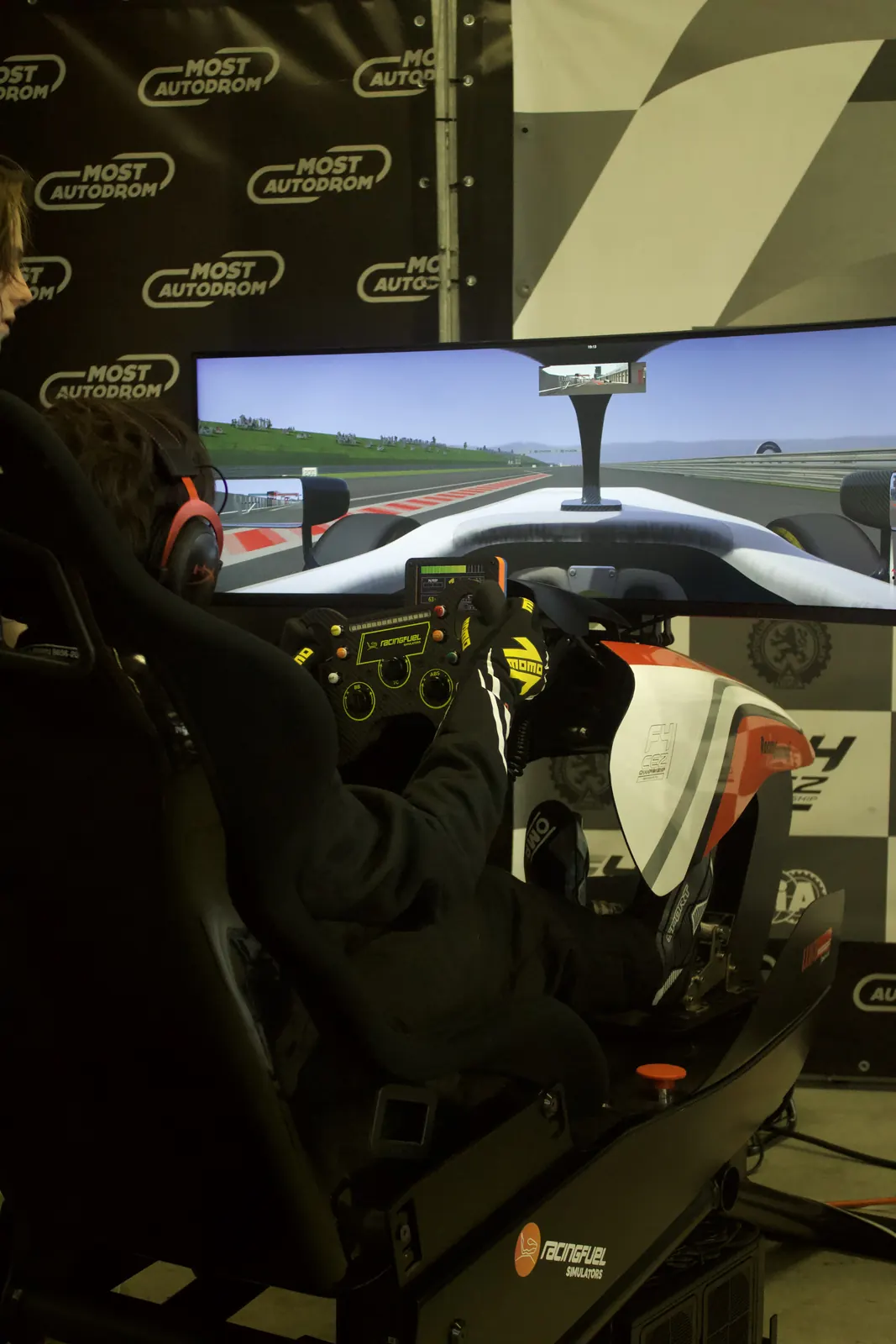 Oliver on a simulator at Autodrom Most